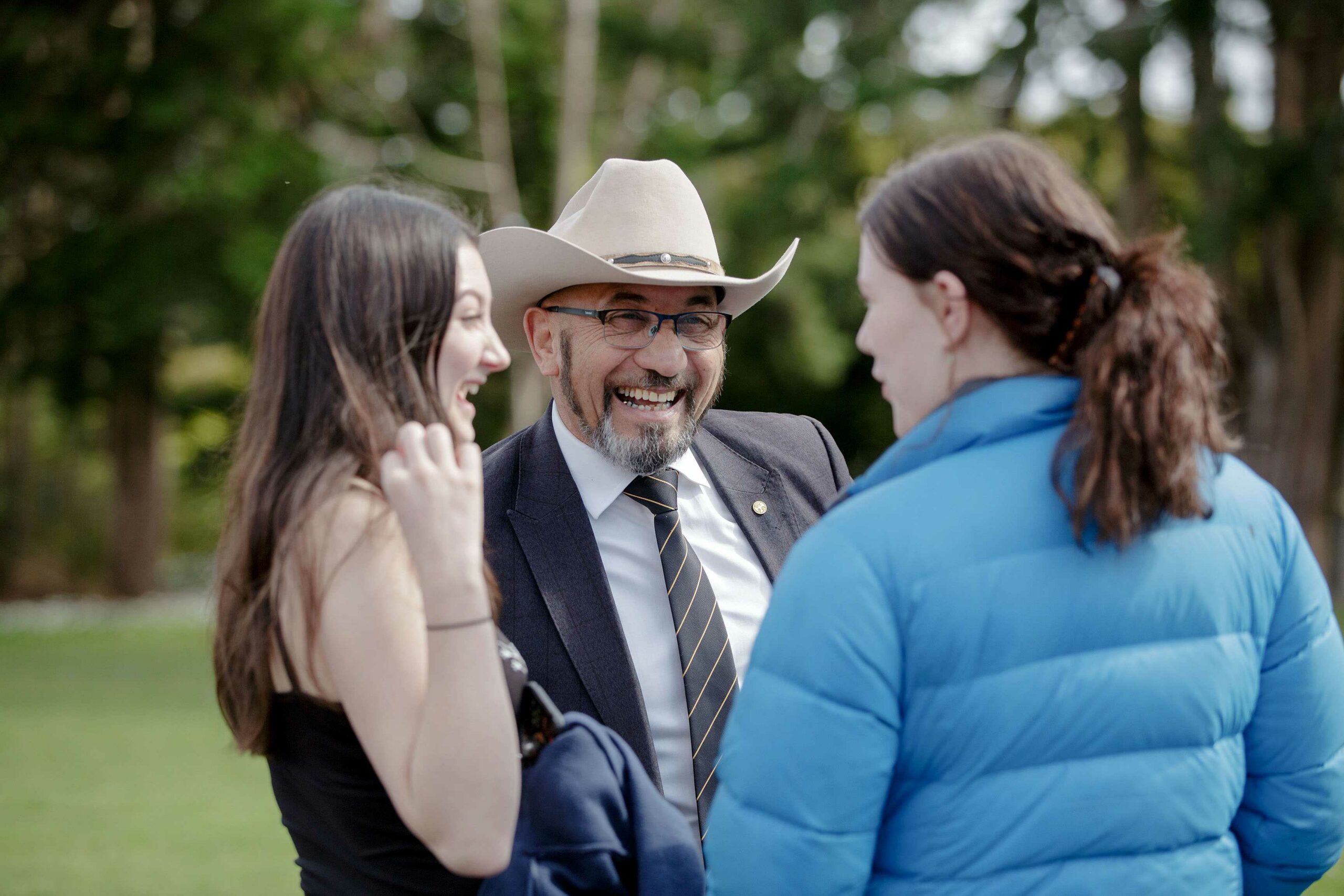 ron mark laughing with two young people in fostercare at face your future